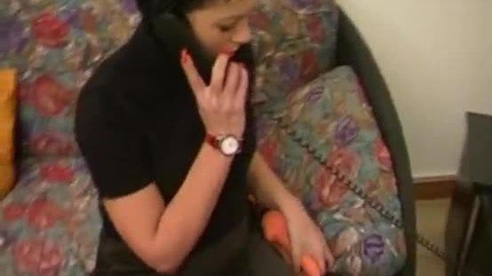 Sex on the phone of a cute brunette at home